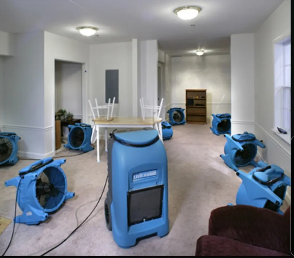 Air movers and dehumidifier setup for Water Extraction & Removal in Coweta